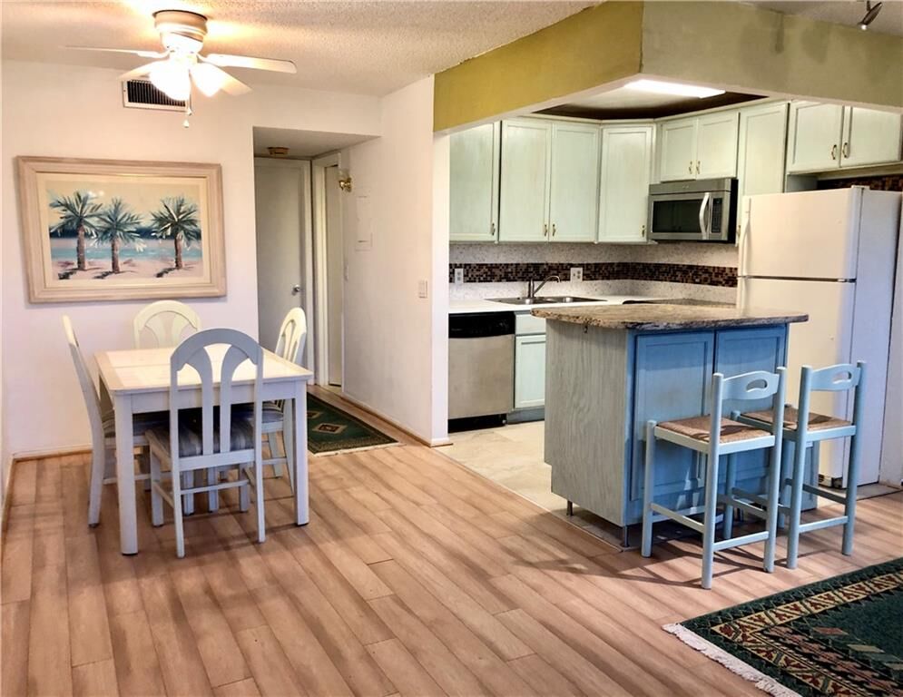 Property Photo:  1225 NW 21st Street 2704  FL 34994 