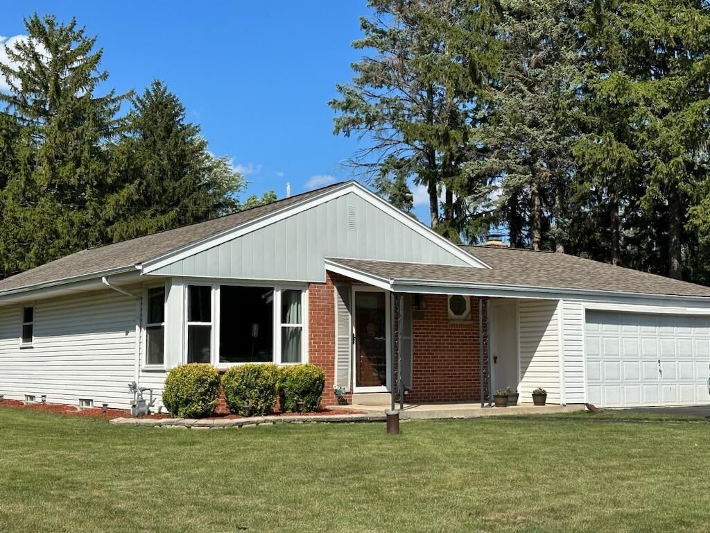 Property Photo:  2110 W Rawson Ave  WI 53154 