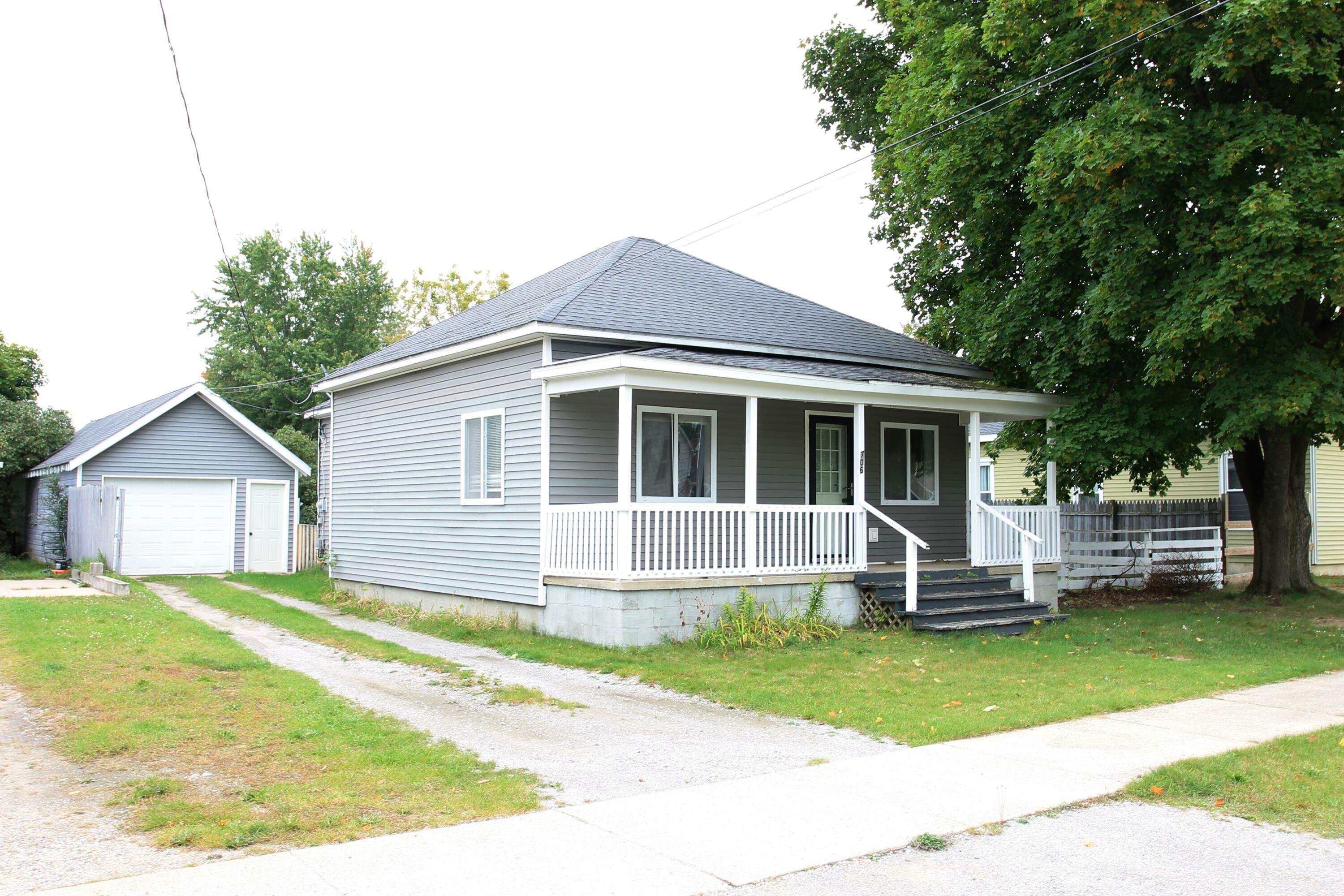 Property Photo:  706 Park Street  MI 49738 