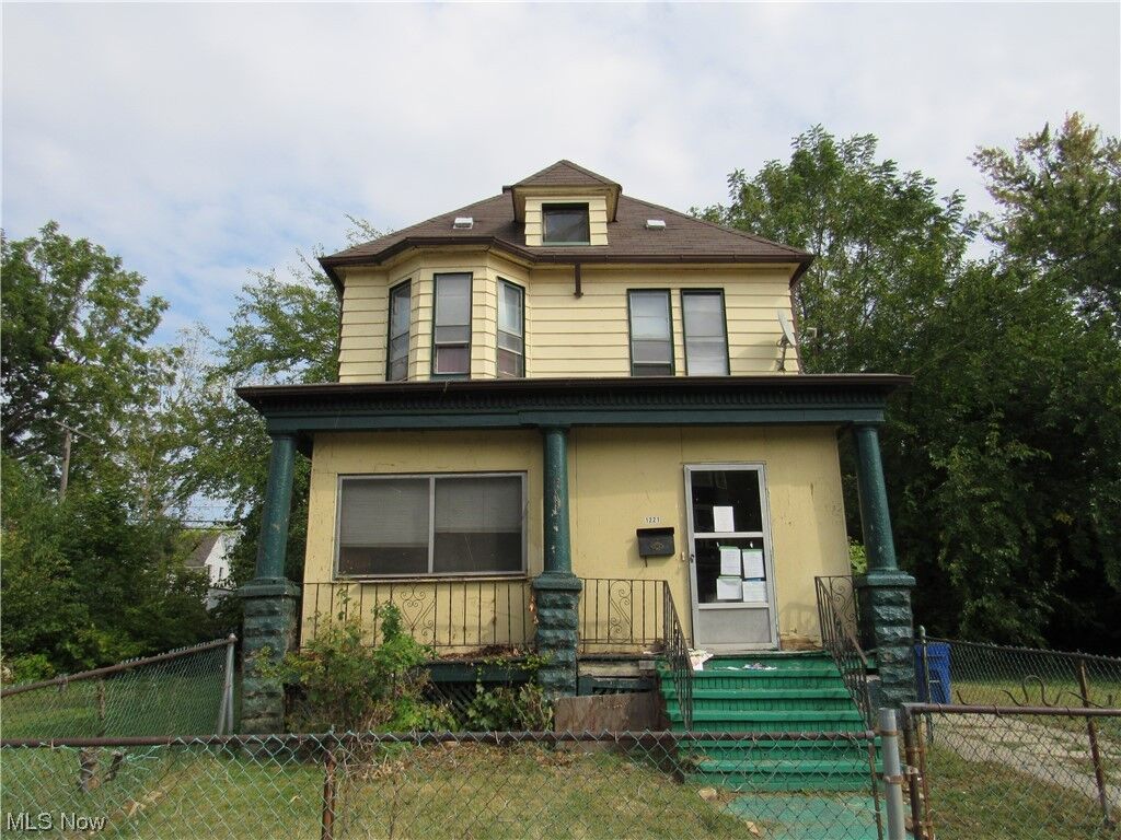 Property Photo:  1221 E 111th Street  OH 44108 