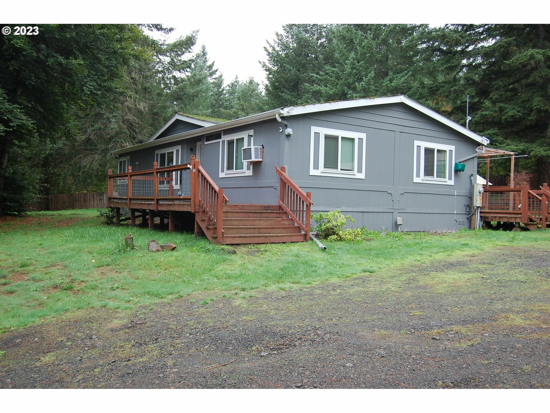 Property Photo:  91302 Poodle Creek Rd  OR 97461 