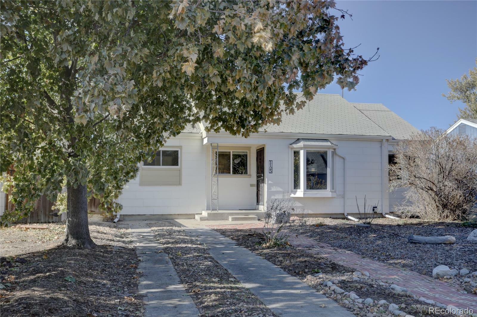 Property Photo:  1125 Kenton Street  CO 80010 