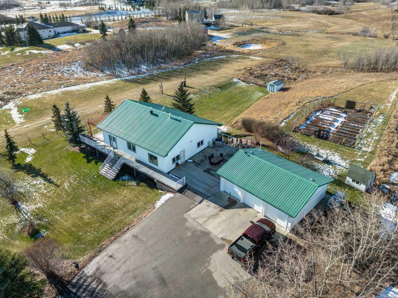 Property Photo: 261049 Bearspaw Road AB T3R 1H6