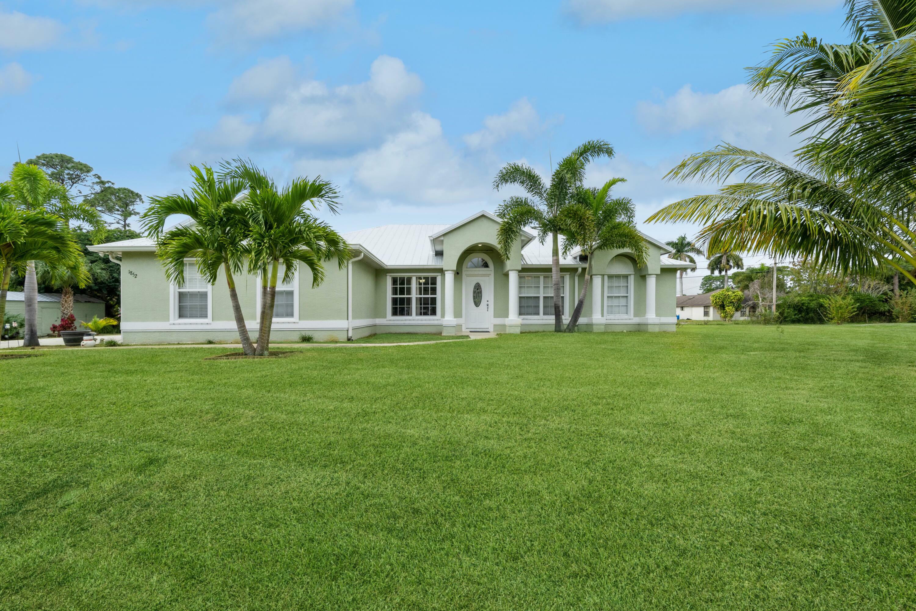 Property Photo:  1852 SW Erie Street  FL 34953 