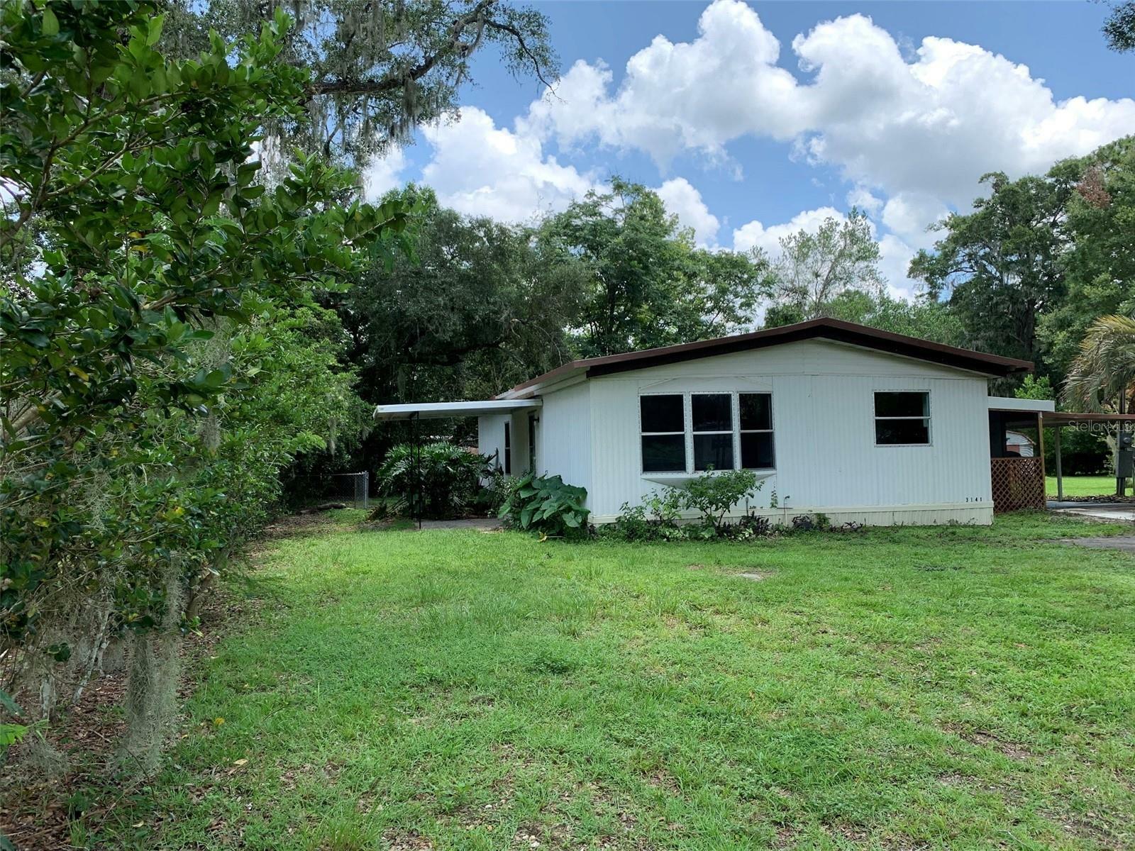 Property Photo:  3141 SE 41st Avenue  FL 34480 