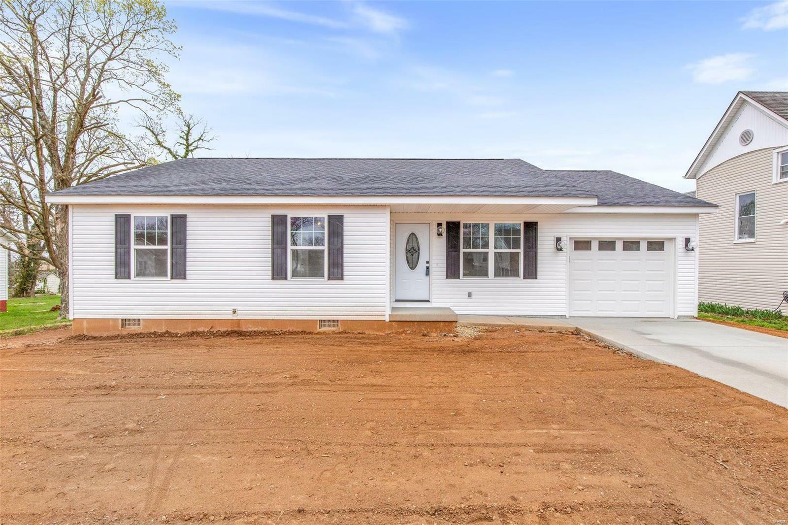 Property Photo:  111 N White Oak Street  MO 63601 