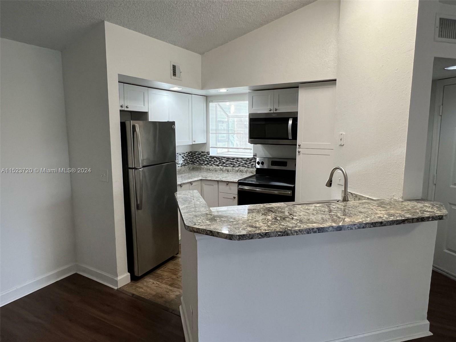 Property Photo:  3380 N Pinewalk Dr N 1127  FL 33063 