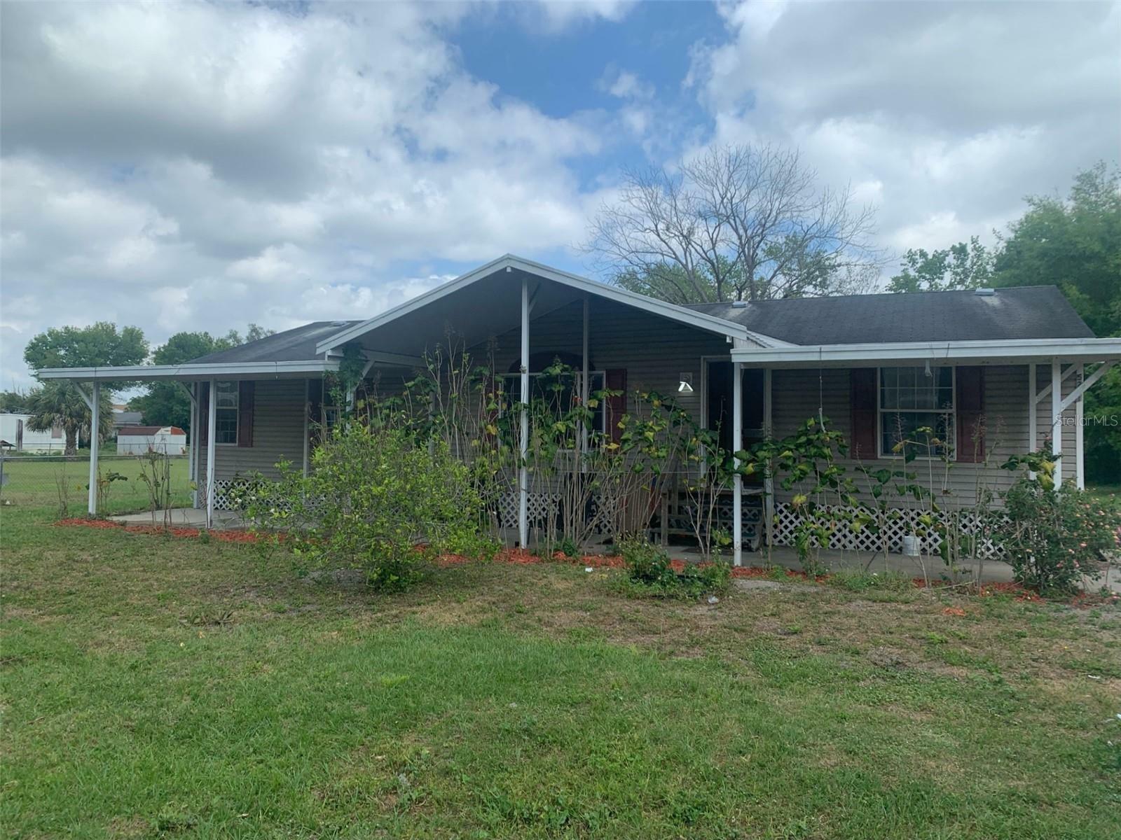 Property Photo:  5211 Miracle Road  FL 32808 