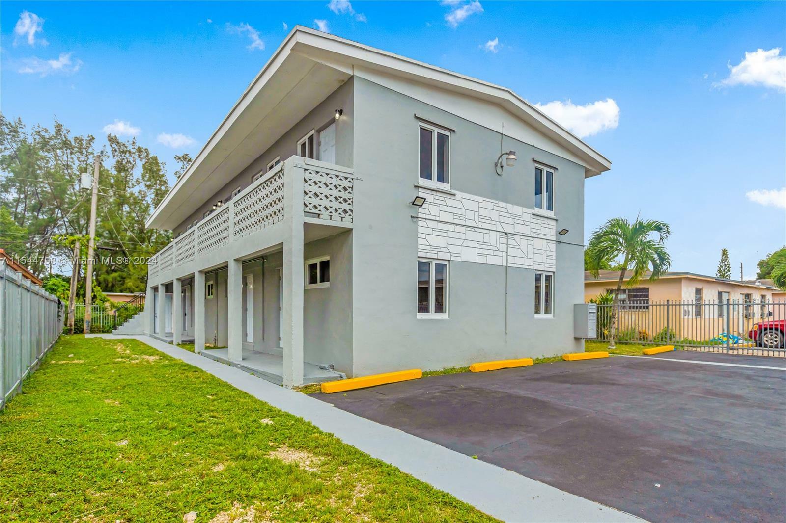 Property Photo:  1430 NW 2nd Ave  FL 33034 