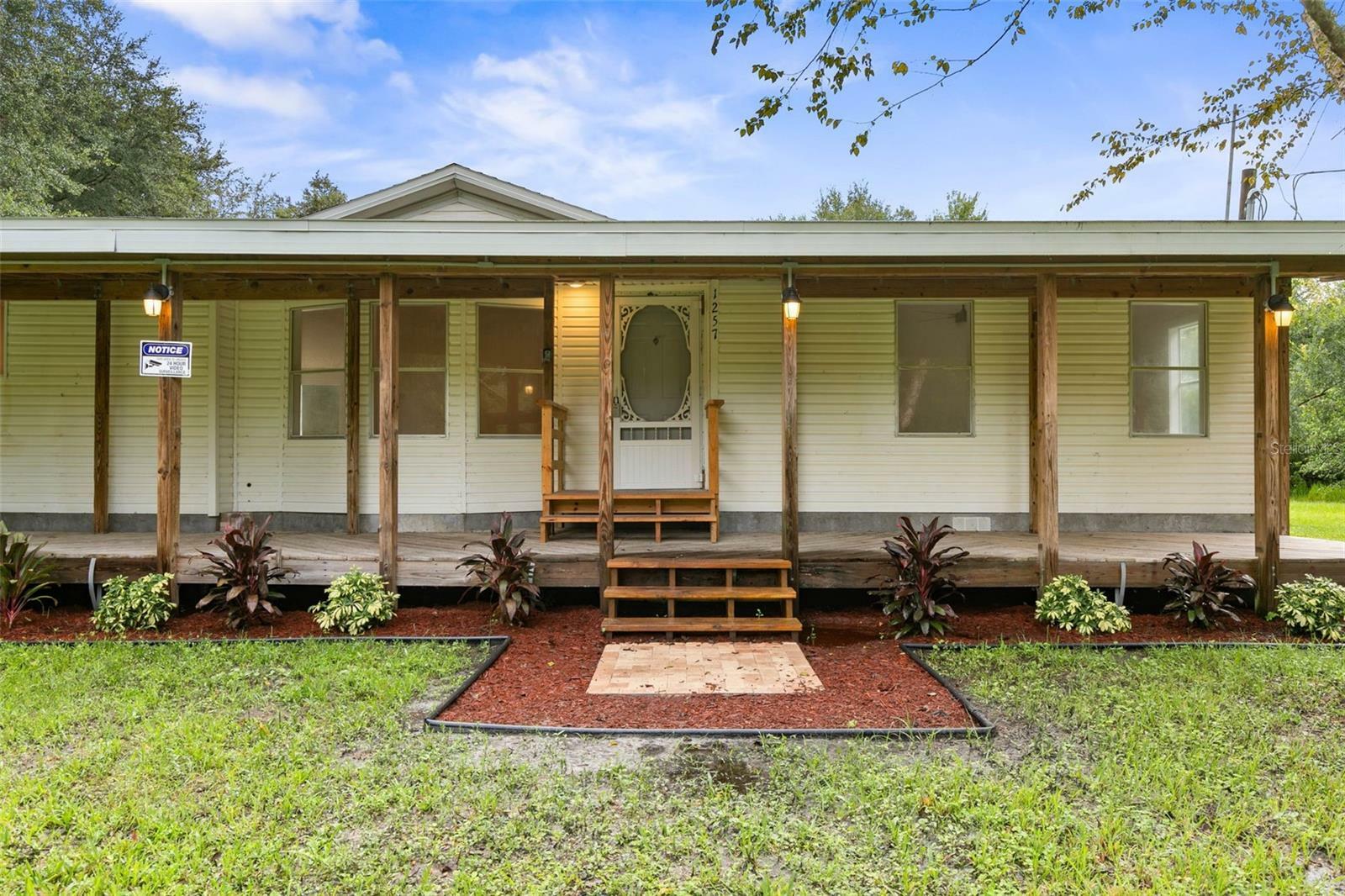 Property Photo:  1257 County Road 75  FL 32110 