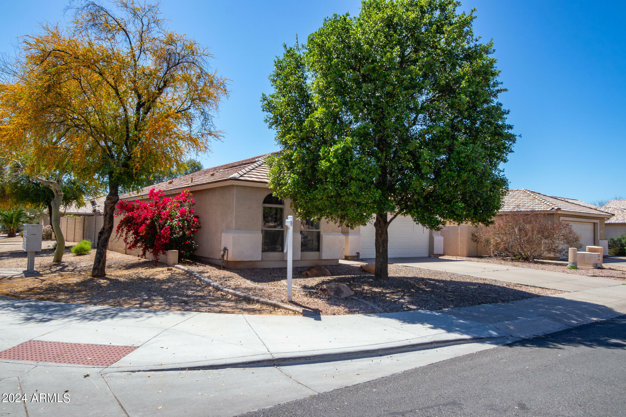 Property Photo:  9125 W Serrano Street  AZ 85037 