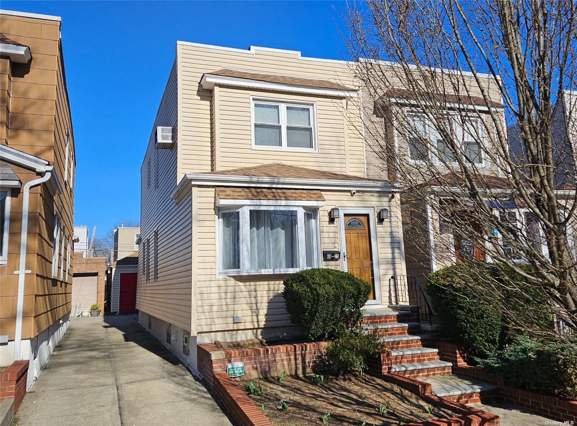 Property Photo: 69-25 67th Place NY 11385