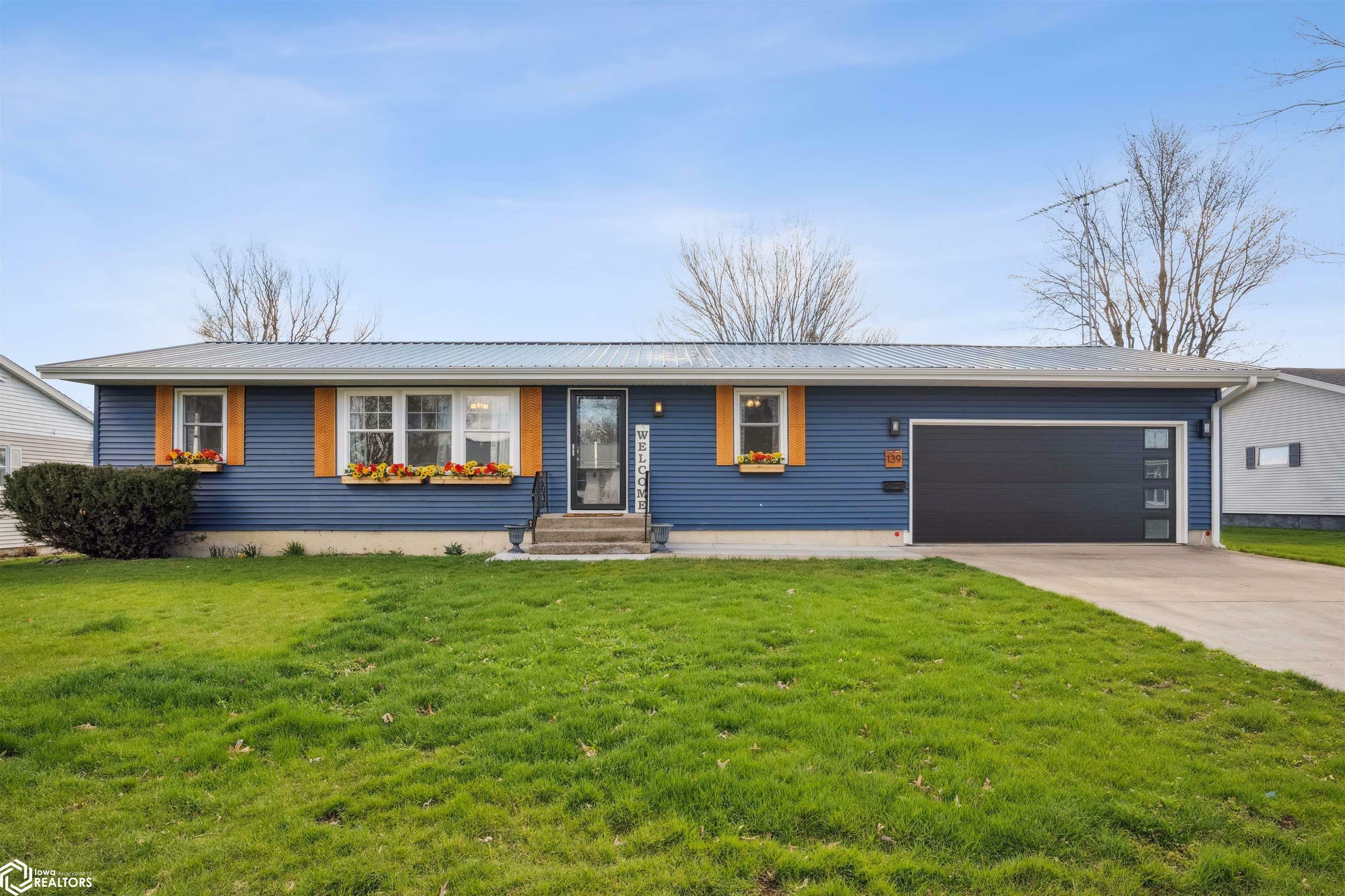 Property Photo:  139 Maple Drive  IA 52637 