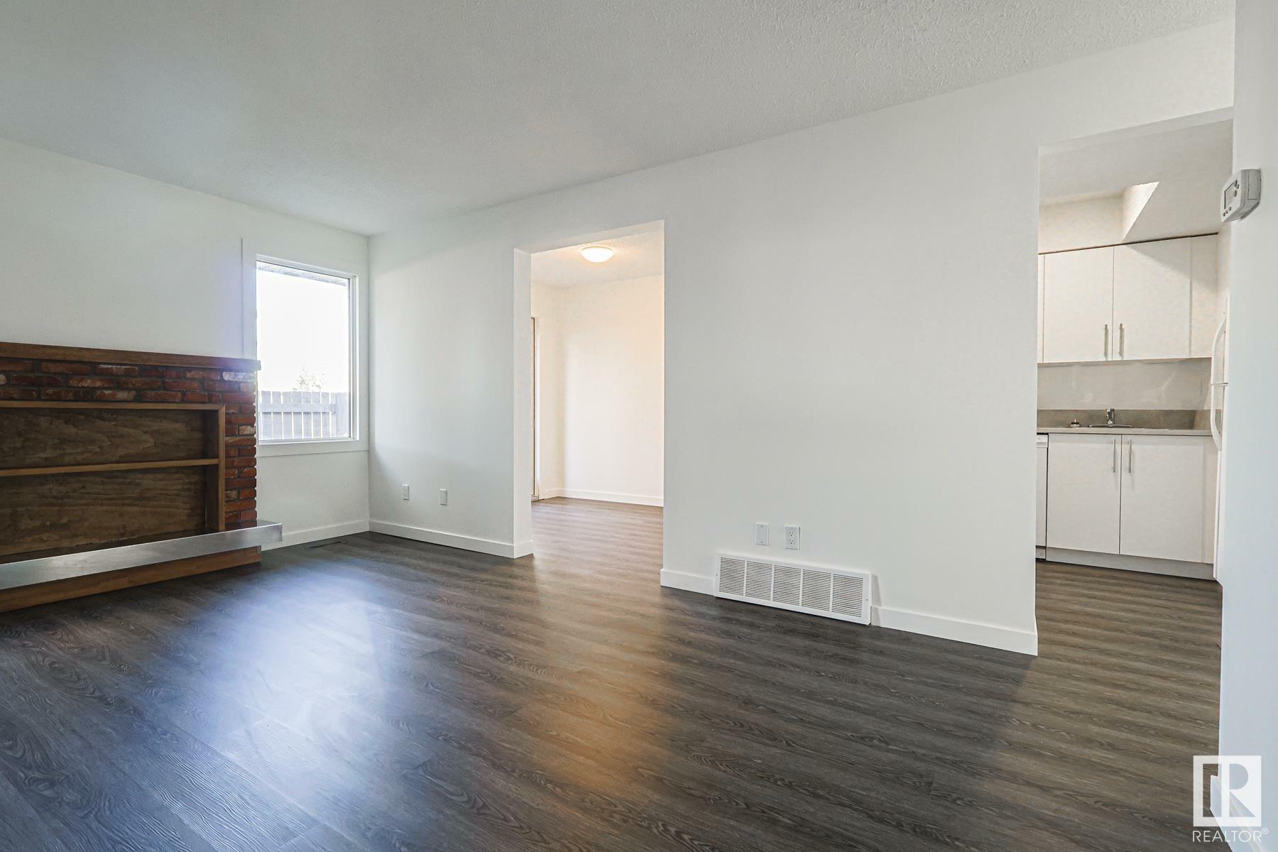 Property Photo:  2307 139 Avenue NW  AB T5Y 1S1 