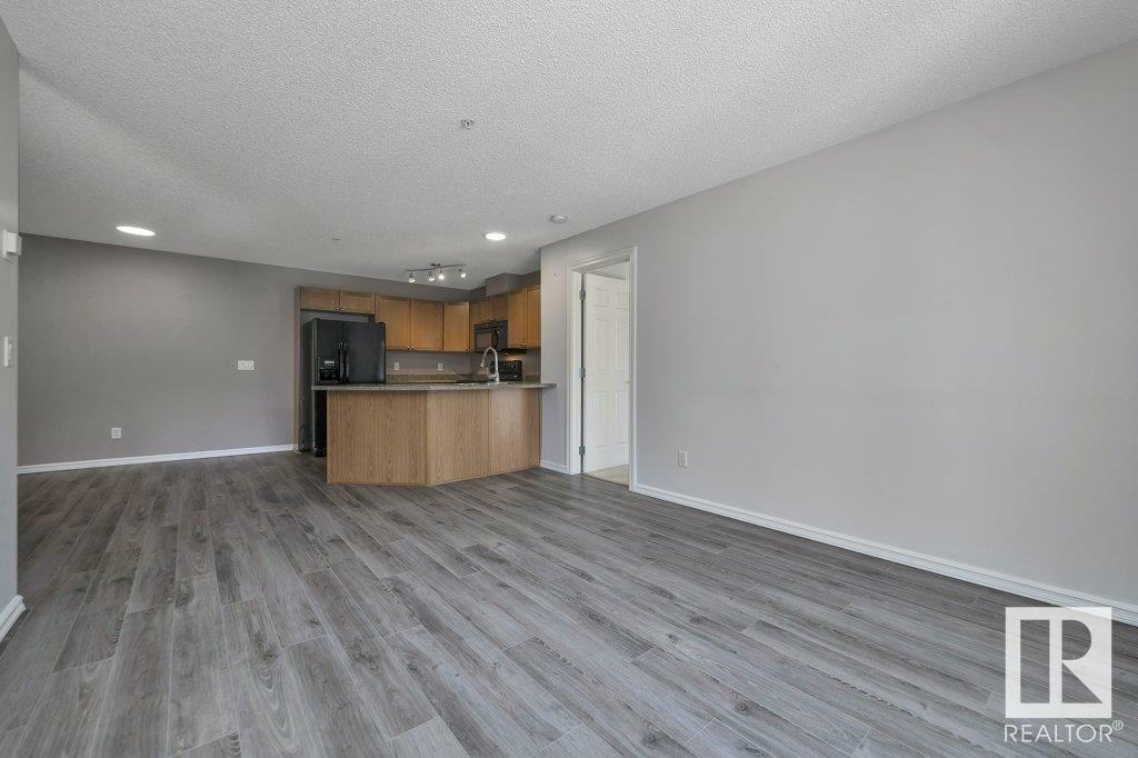 Property Photo:  15211 139 Street NW 204  AB T6V 0A1 