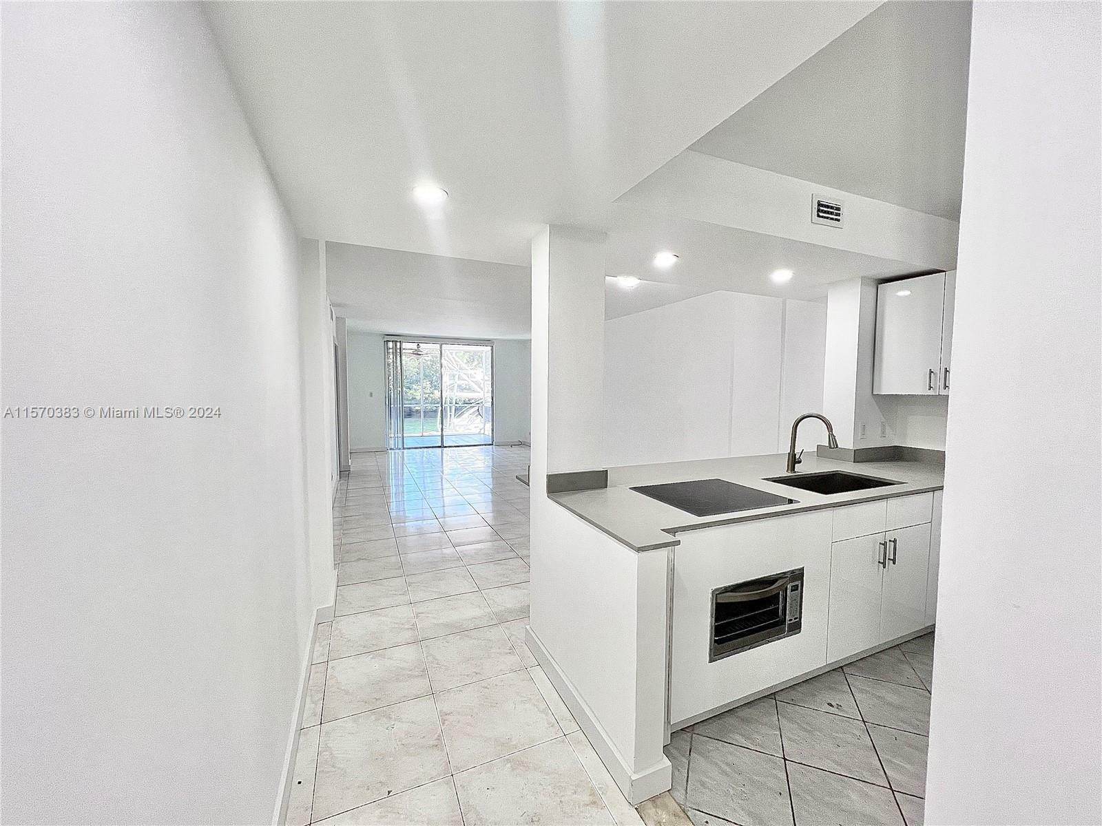 Property Photo:  3660 NE 166th St 114  FL 33160 