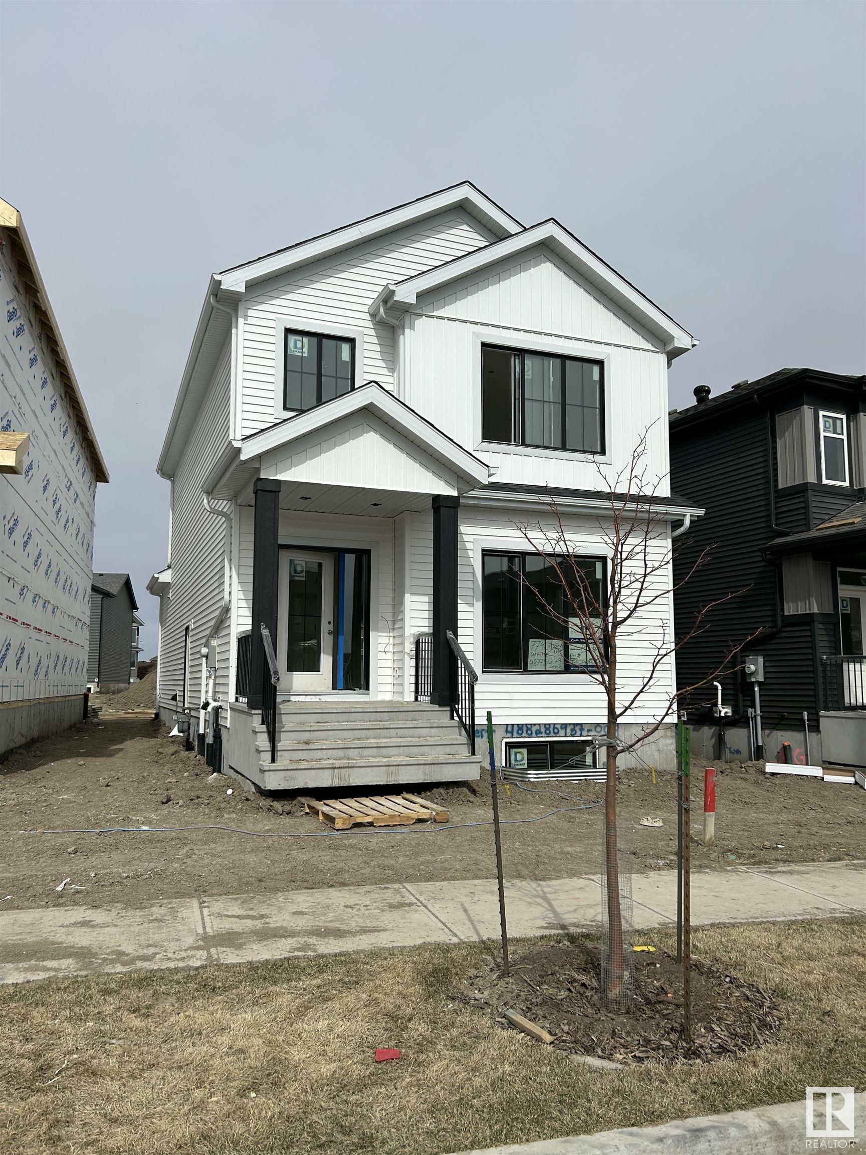 Property Photo:  774 Cy Becker Drive NW  AB T5Y 0W3 
