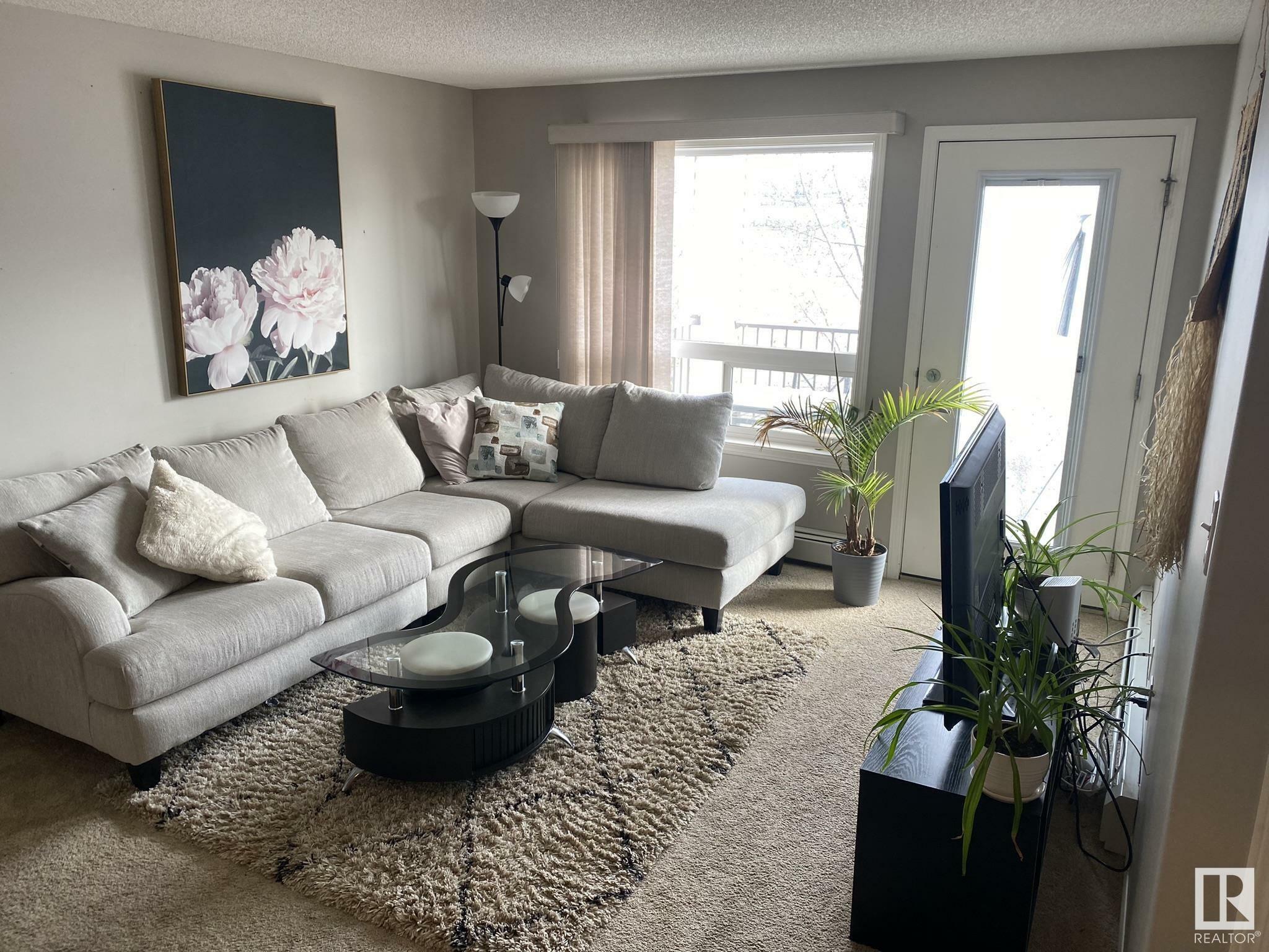 Property Photo:  320 Clareview Station Drive NW 2210  AB T5Y 0E5 