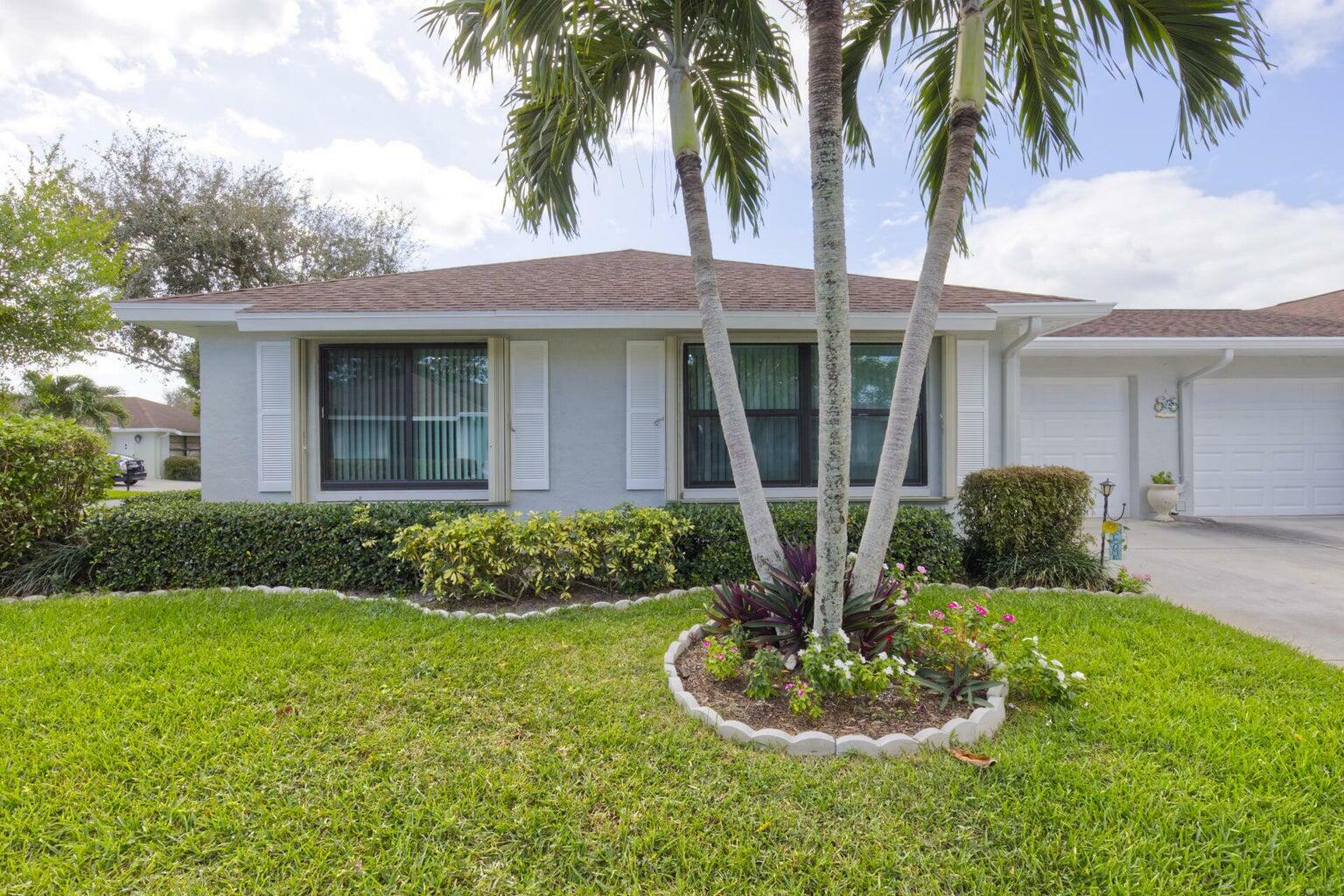 Property Photo:  9820 Tabebuia Tree Drive A  FL 33436 