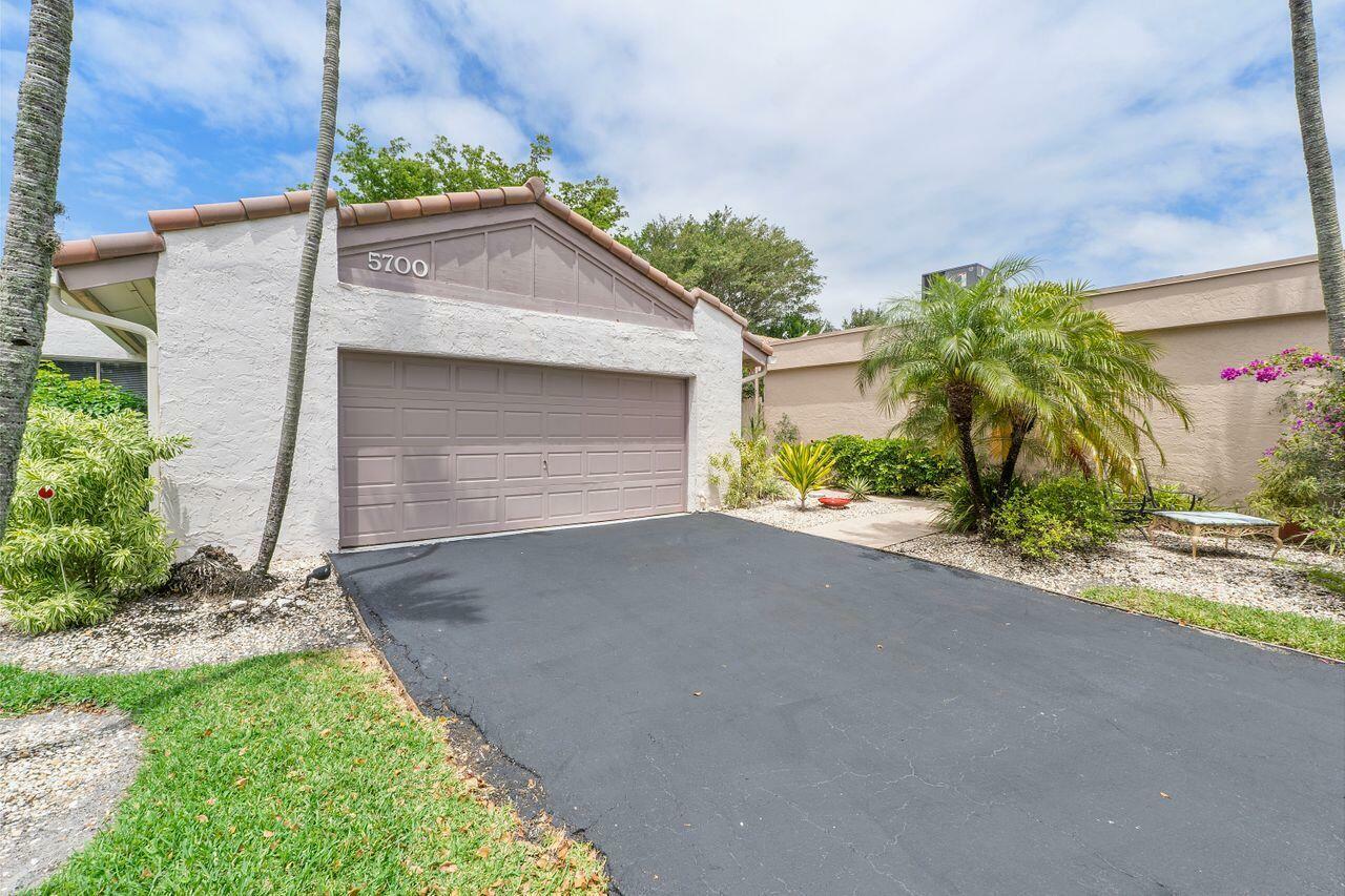 Property Photo:  5700 Piping Rock Drive  FL 33437 