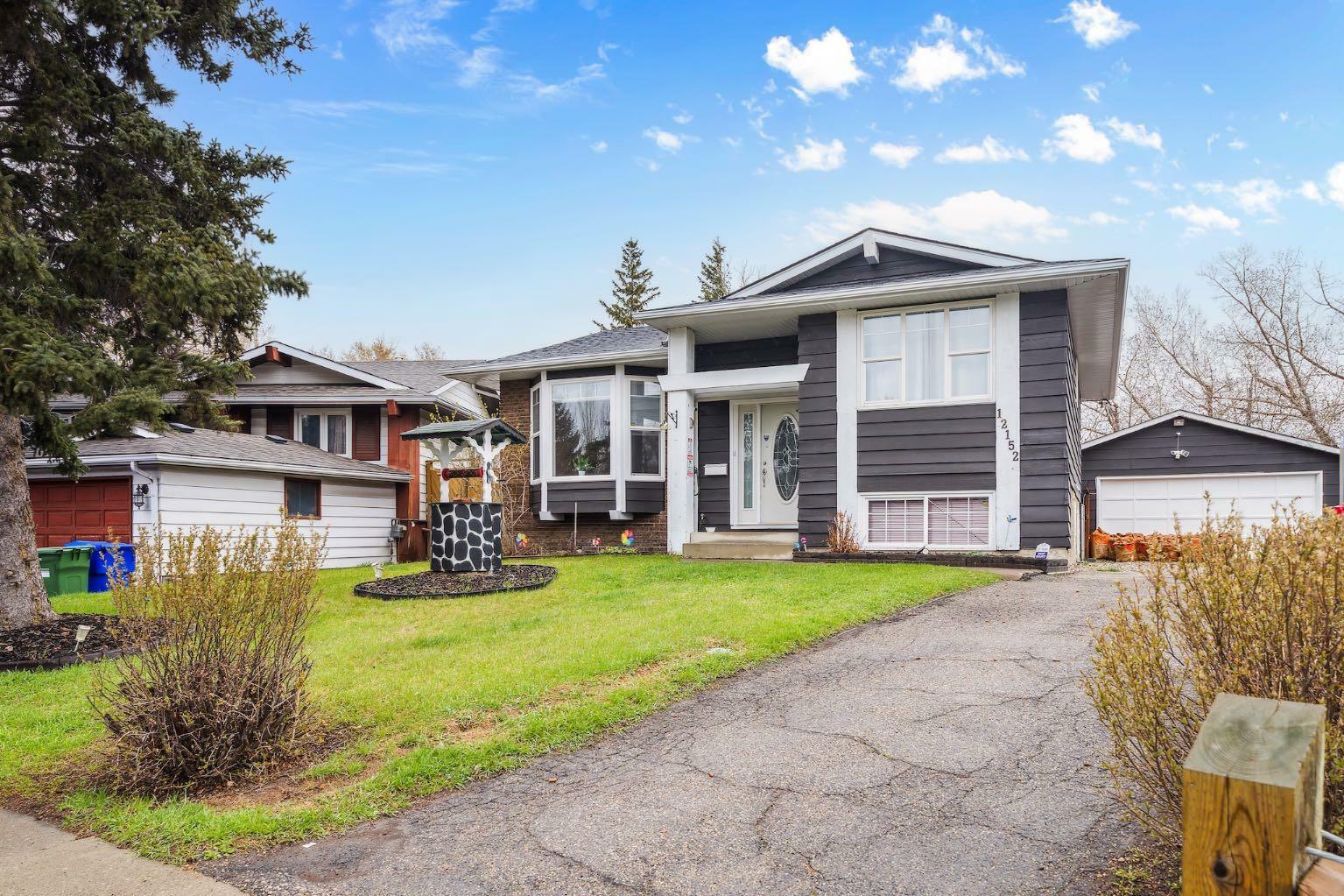 Property Photo:  12152 Canfield Road SW  AB T2W 1V2 