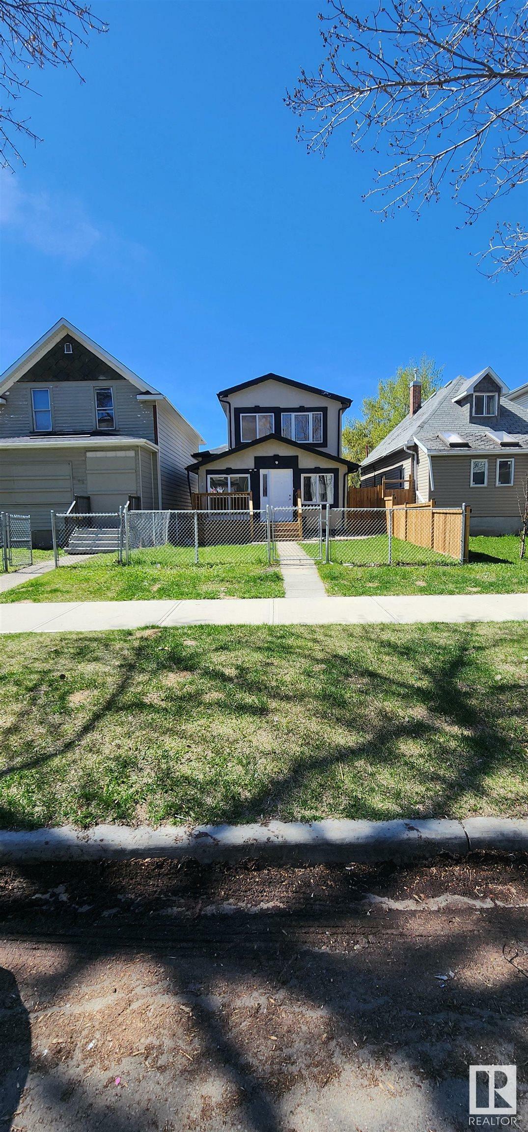 Property Photo:  10712 103 Street NW  AB T5H 2V8 