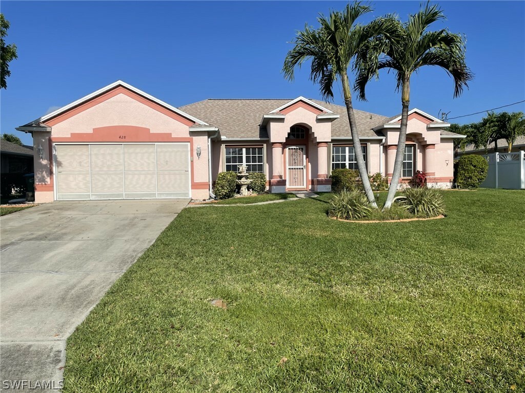 Property Photo: 428 SE 13th Place FL 33990