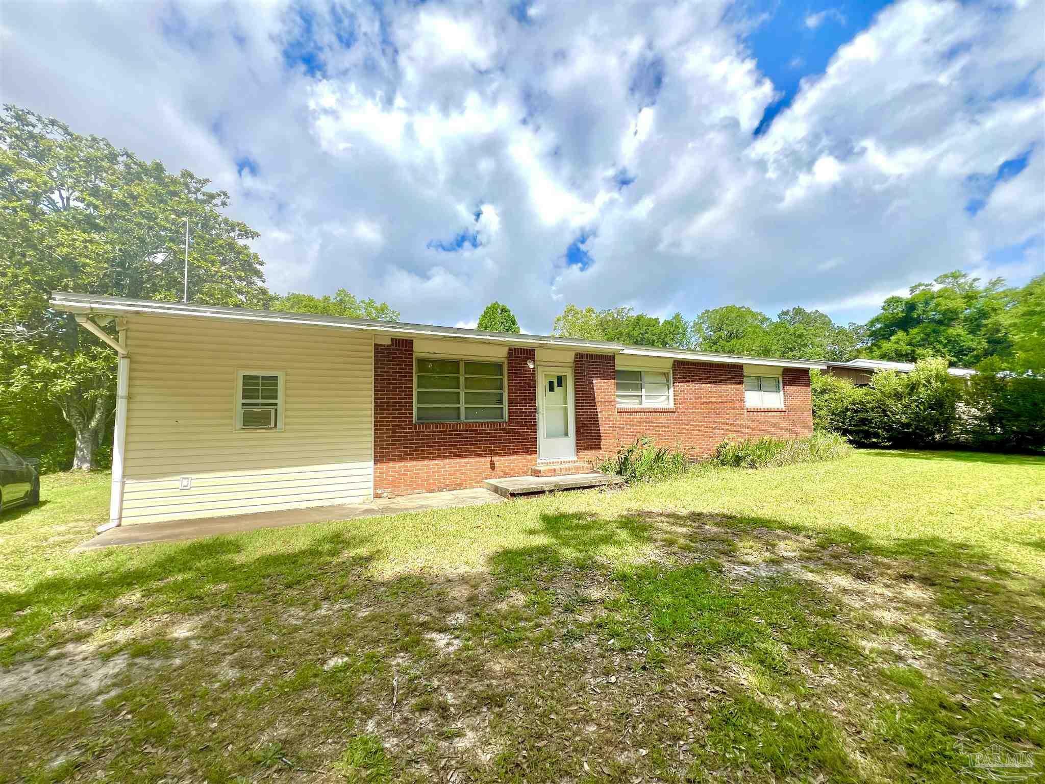 Property Photo:  11501 Chemstrand Rd  FL 32514 