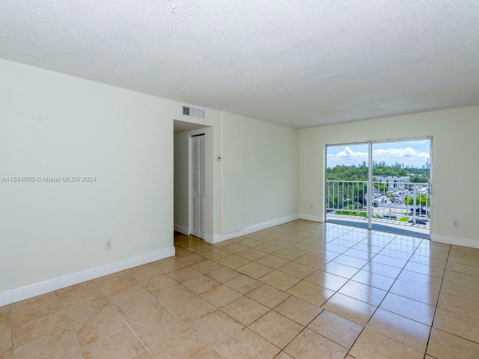 Property Photo:  484 NW 165th St Rd A615  FL 33169 