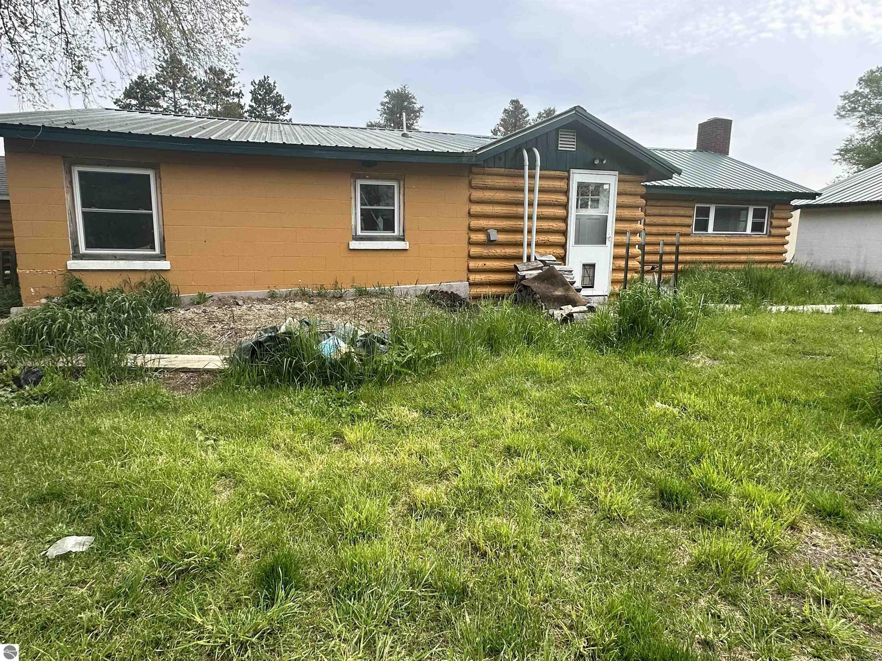 Property Photo:  21025 Cadillac Highway M-115  MI 49625 