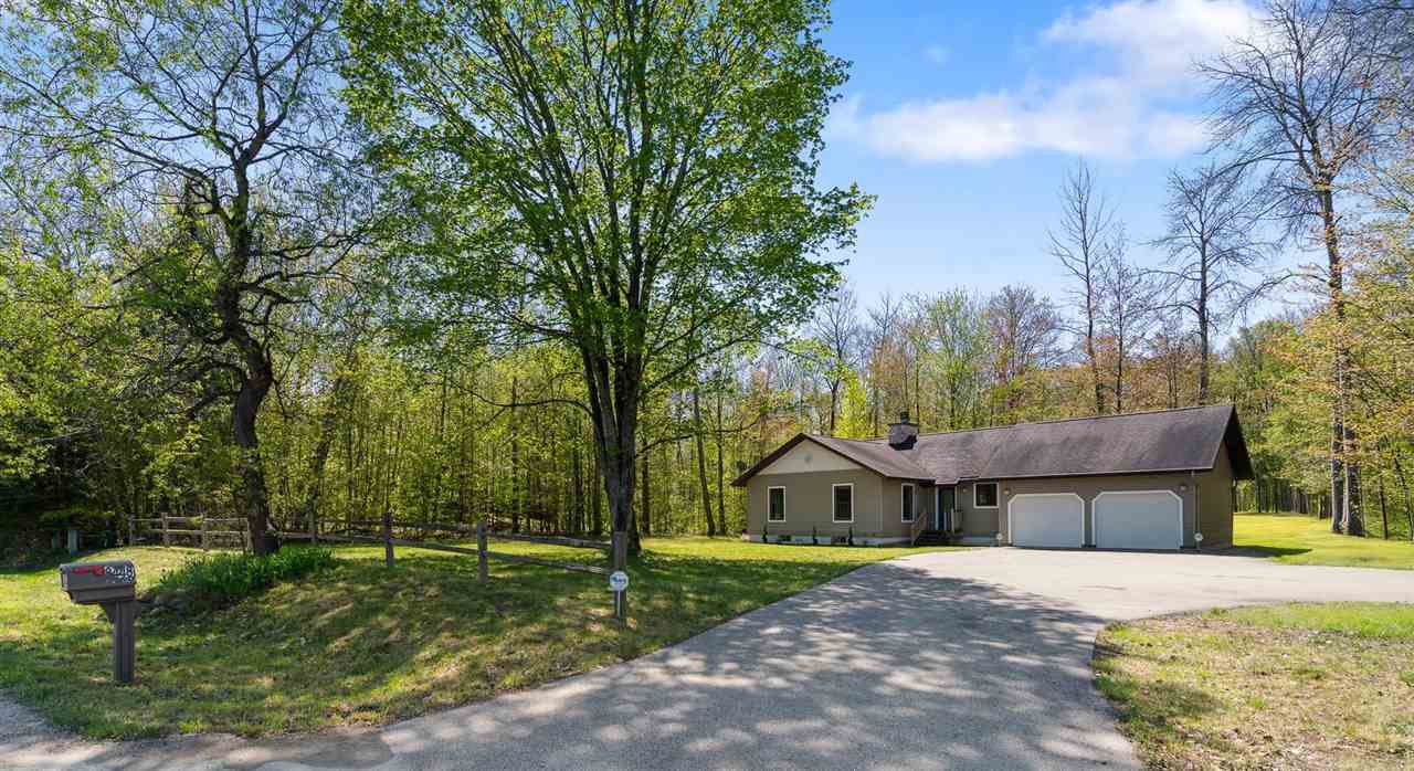 Property Photo:  8448 Pickerel Lake  MI 49770 