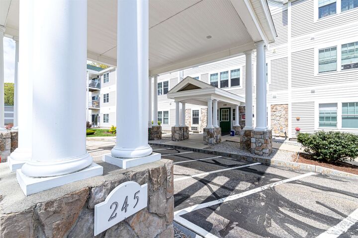 Property Photo:  245 Edward J Roy Drive  NH 03104 