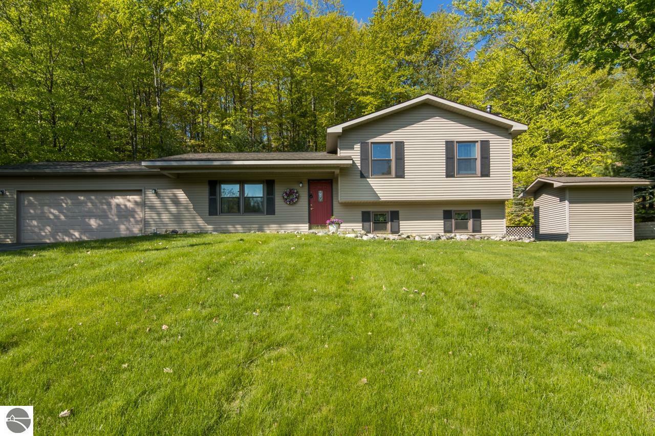 Property Photo:  4767 Hampshire Drive  MI 49690 