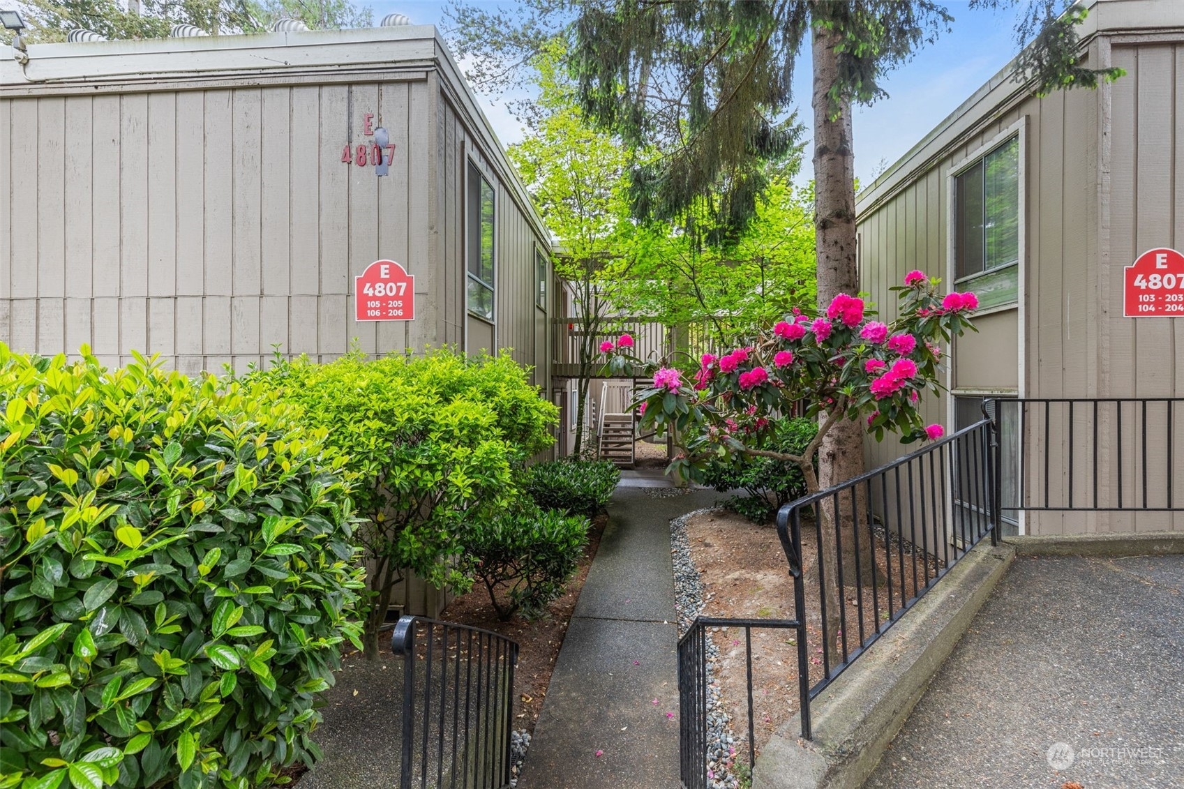 Property Photo:  4807 180th Street SW E106  WA 98037 