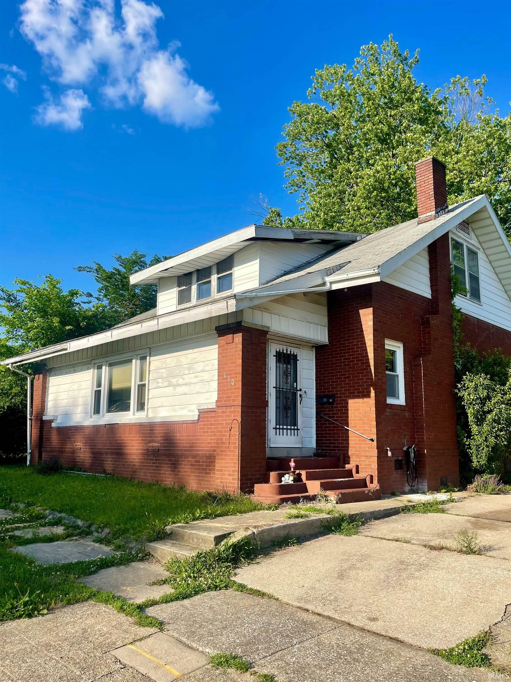 Property Photo:  110 N Seminary Street  IN 47670 