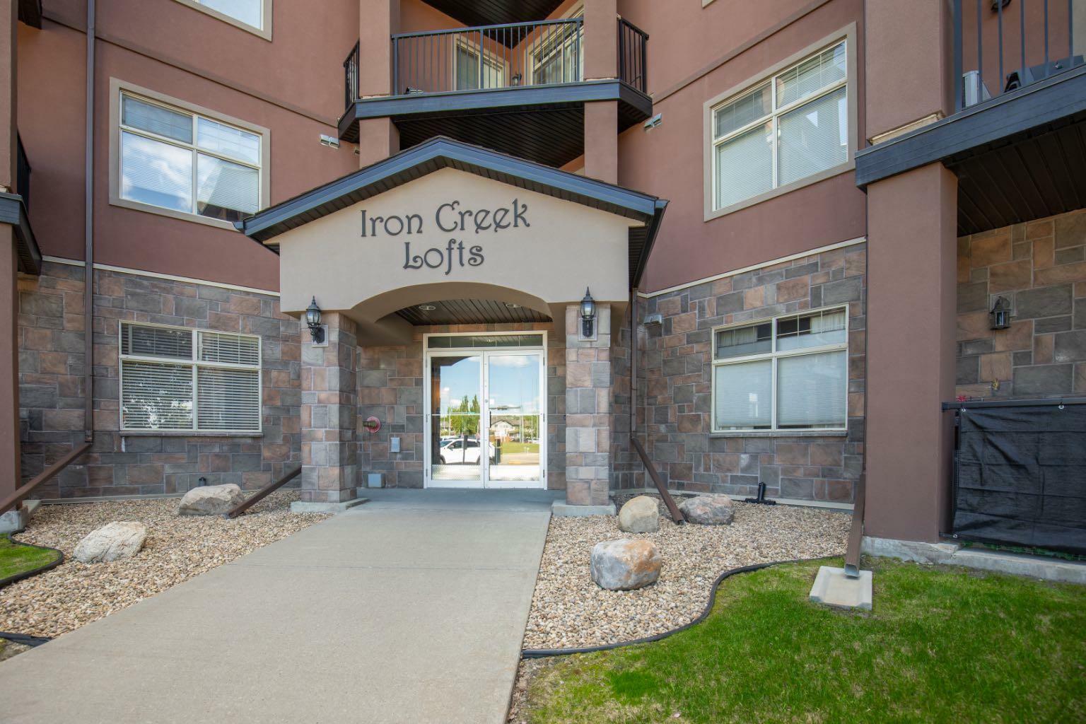 Property Photo: 69 Ironstone Drive 215 AB T4R 0J8