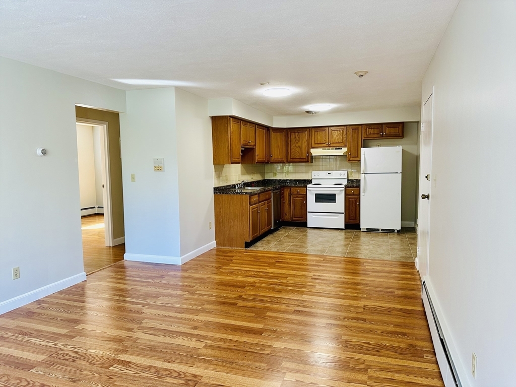 Property Photo:  1105 Lexington Street 8-4  MA 02452 