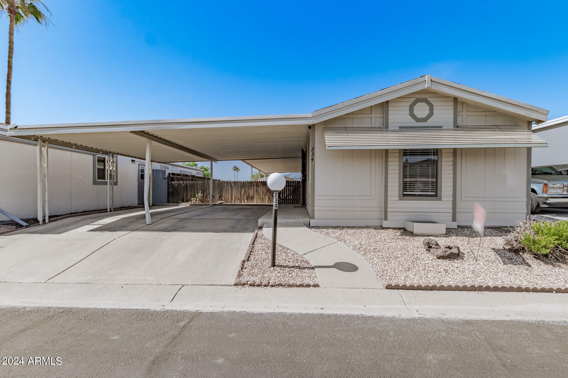 Property Photo:  10951 N 91st Avenue 234  AZ 85345 