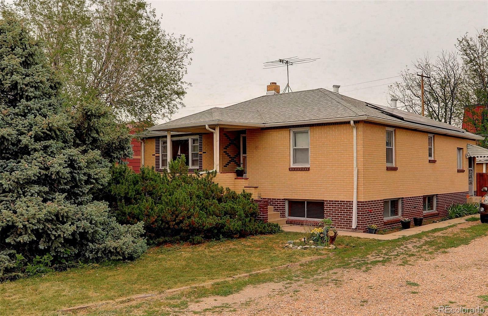 Property Photo:  1930 Billings Street  CO 80011 