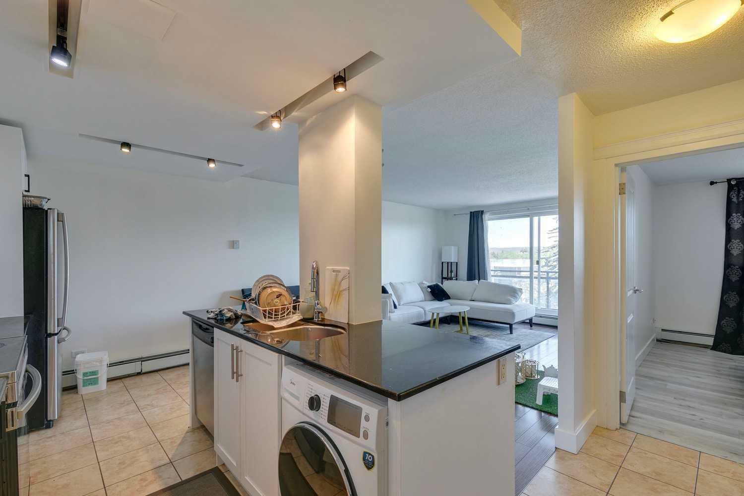 Property Photo:  1022 16 Avenue NW 506  AB T2M 0K5 