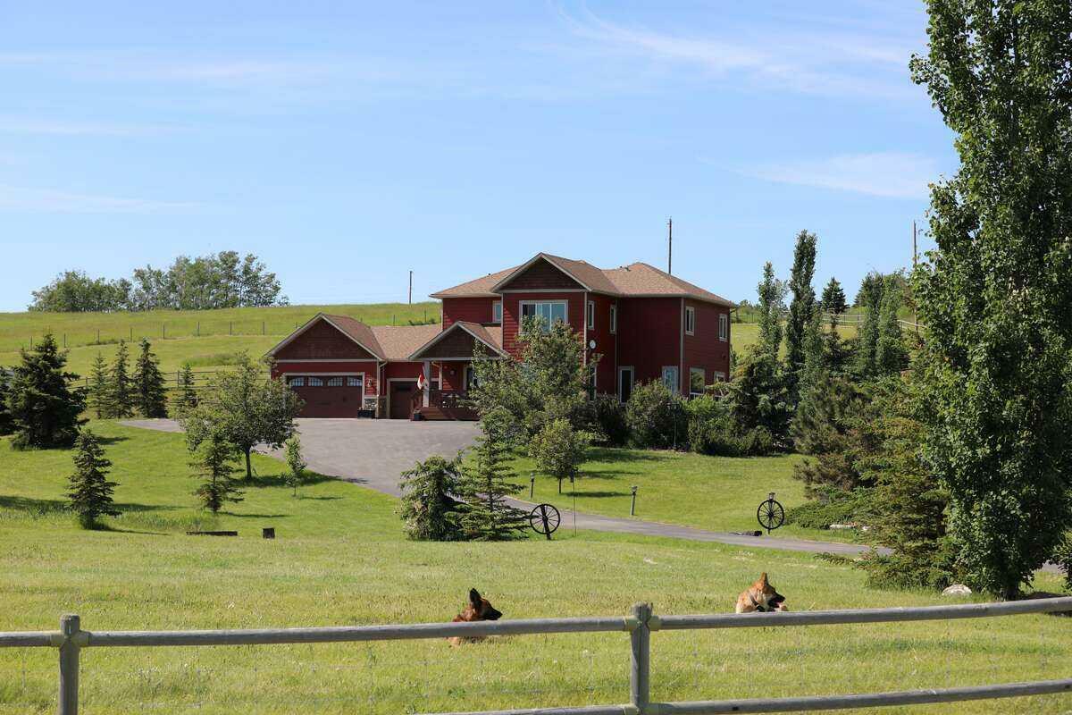 Property Photo: 32015 292 Avenue E AB T1S 4P7