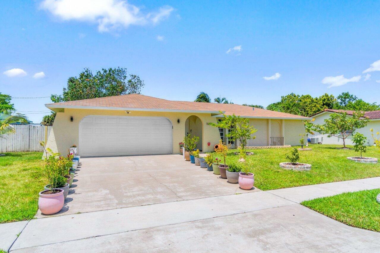 Property Photo:  1681 NW 8th Street  FL 33486 