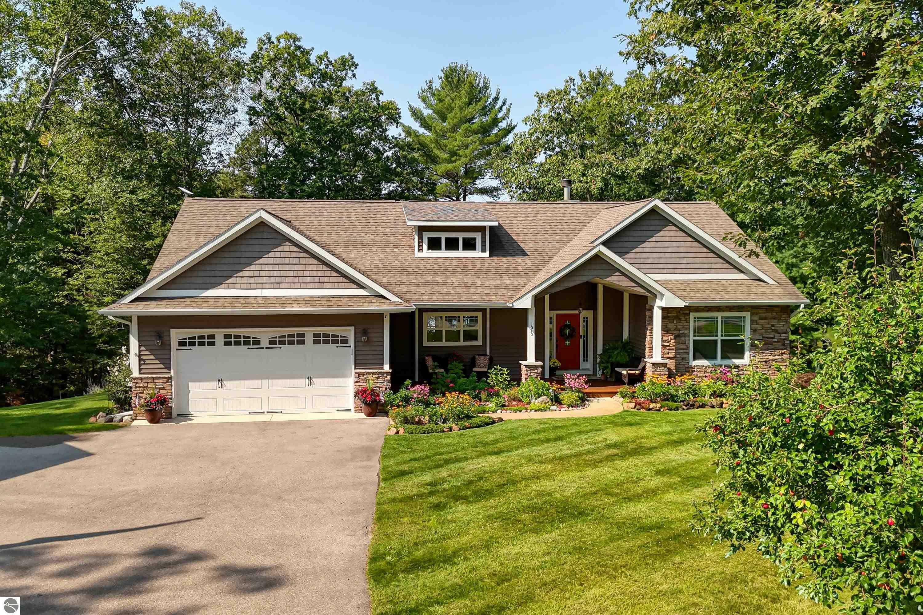 Property Photo:  1010 Tranquil Point Road  MI 49696 