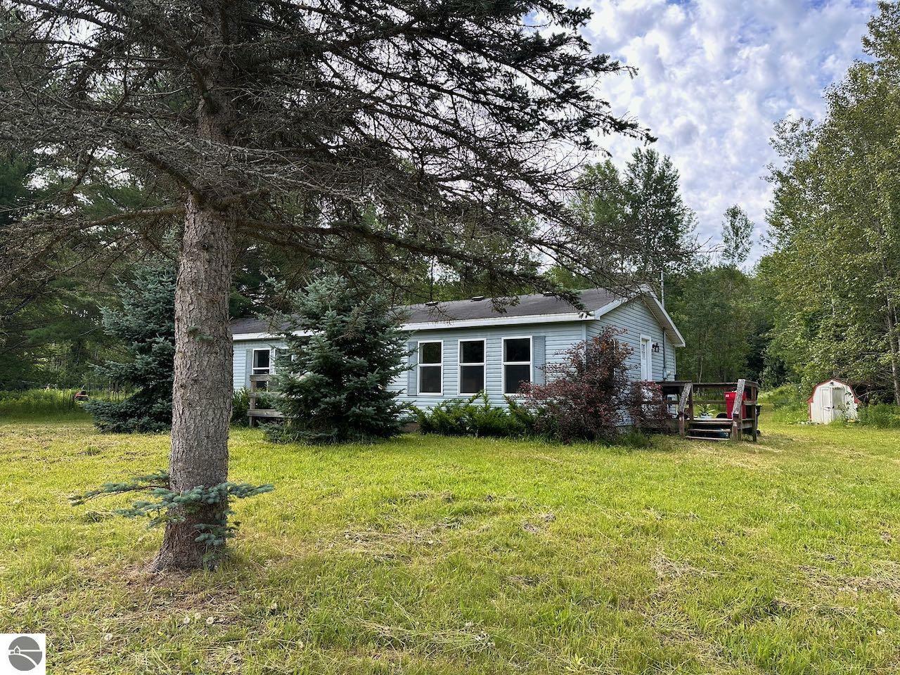 Property Photo:  6699 Alden Highway  MI 49615 