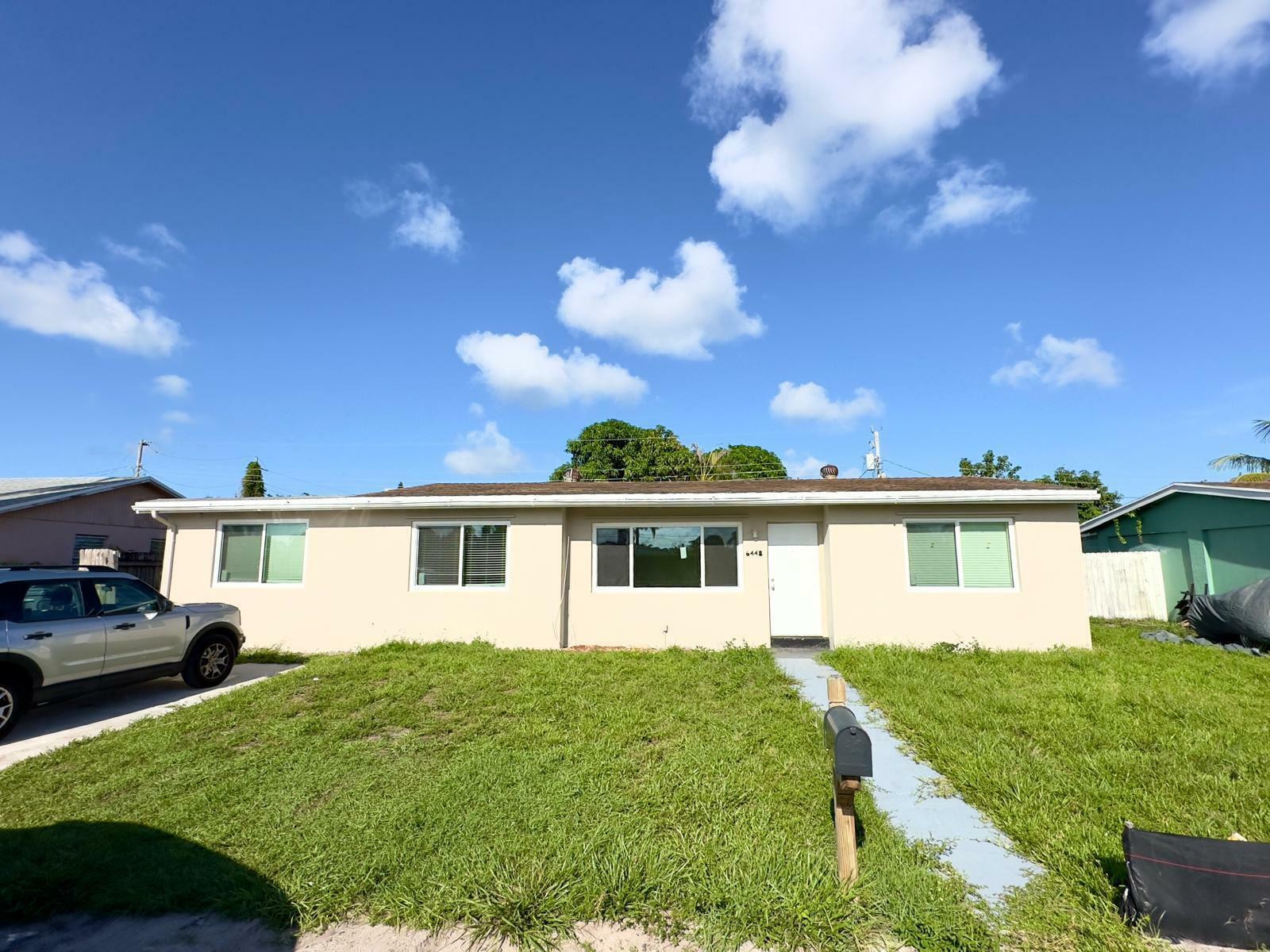 Property Photo:  6448 Lawrence Road  FL 33462 