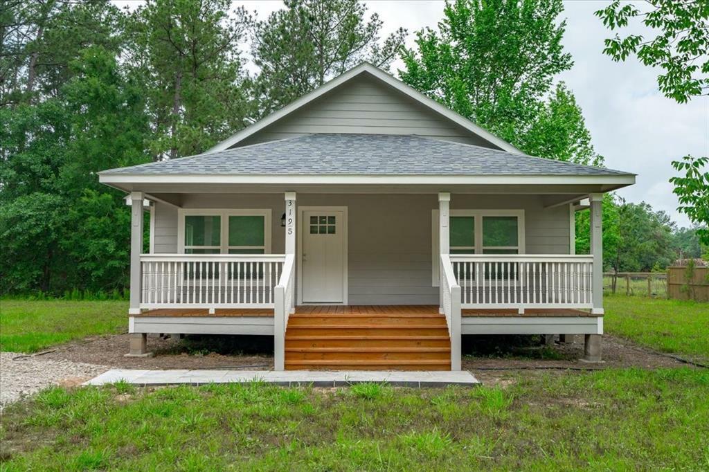 Property Photo: 3195 Mangum Road TX 77351