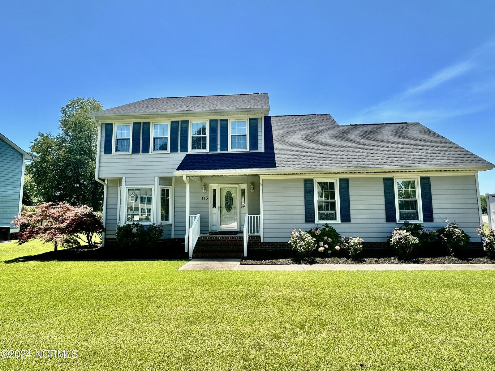 Property Photo:  115 Plantation Boulevard  NC 28540 