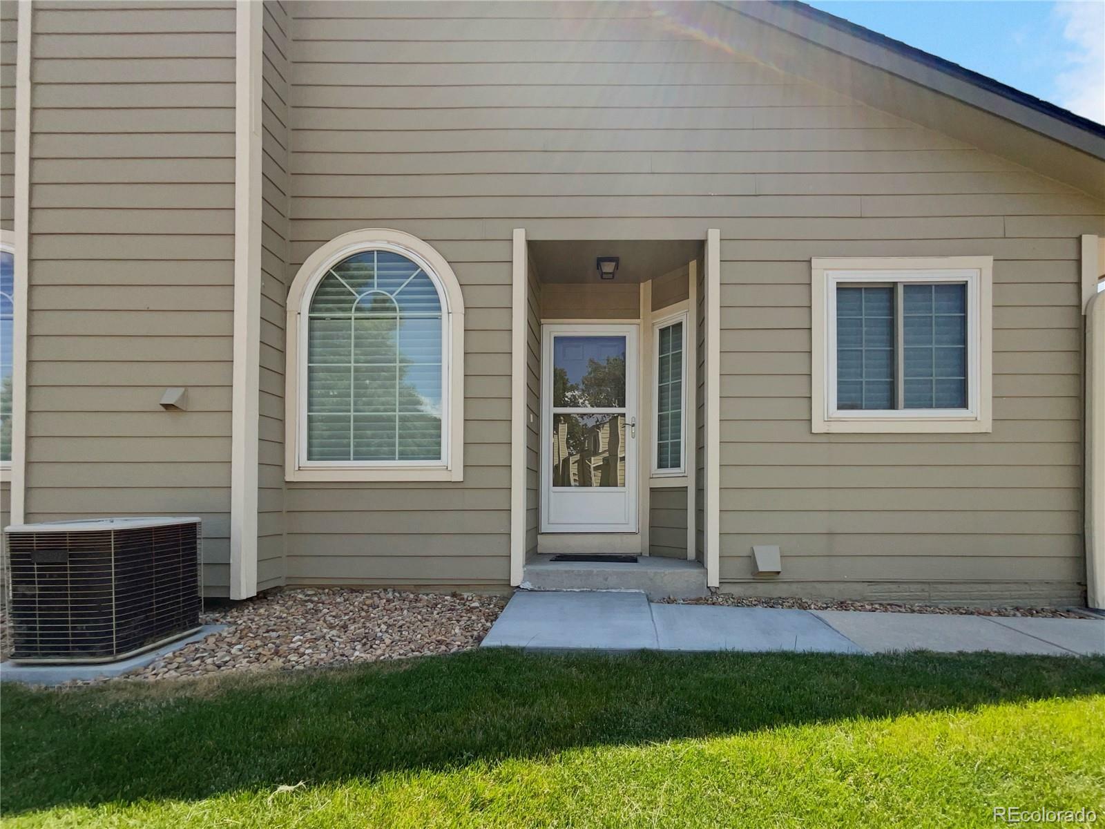 Property Photo:  10400 W Fair Avenue A  CO 80127 