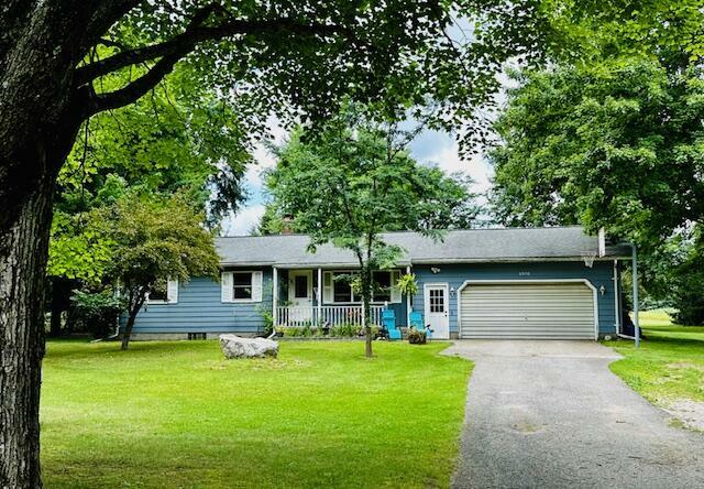 Property Photo:  6976 E Garfield Road  MI 49421 