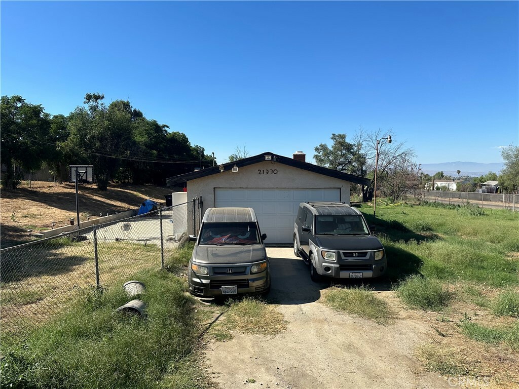 Property Photo:  21330 Orange Avenue  CA 92570 